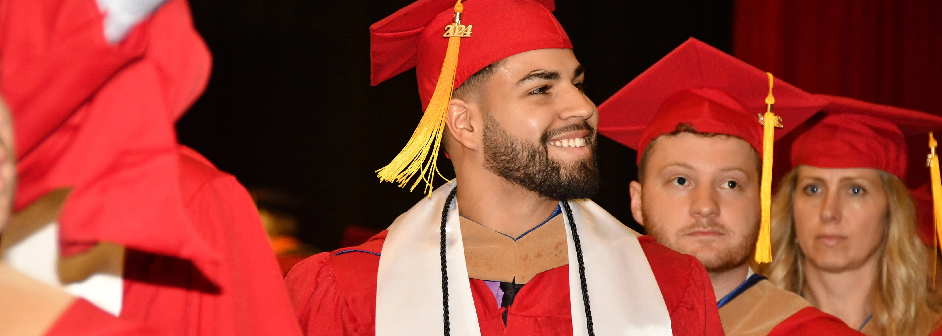 SUNY Stony Brook University College of Business Students at Convocation in their caps and gowns